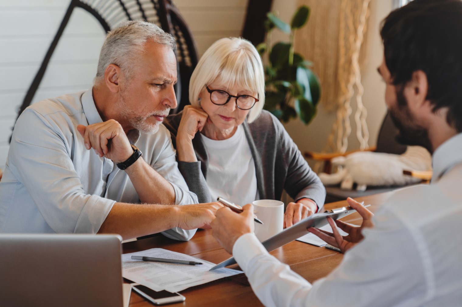 Financial advisor explaining paperwork